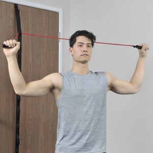 Person using Prepak Economy Gym on a door