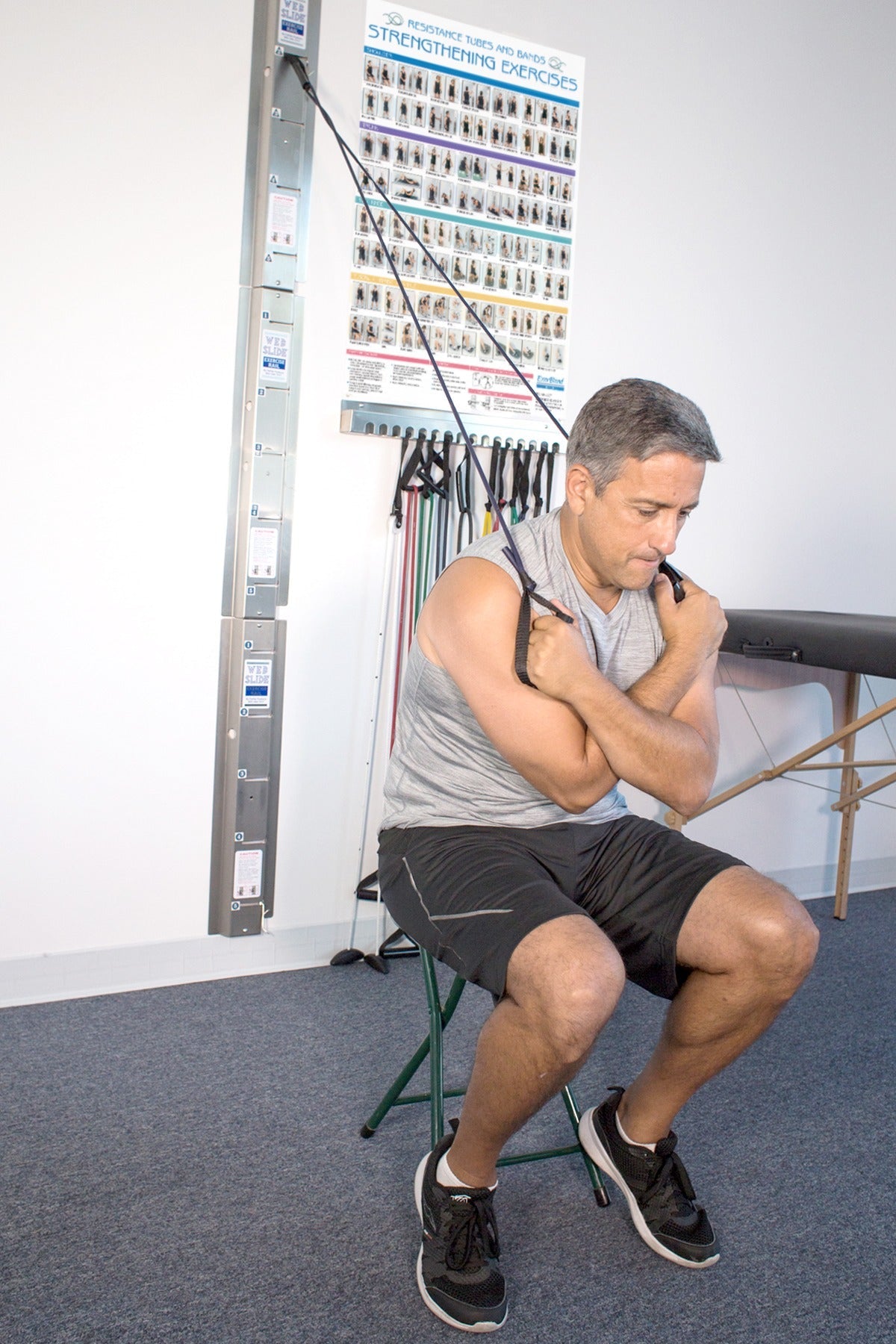 Individual using Web Slide® Exercise Rail