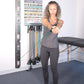A person using a 3 ft. Unilateral Loop with Handle Heavy Resistance hooked up to a webslide in a training room